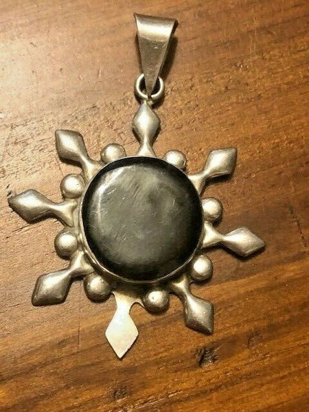 A Sterling Silver Pendant We Named Succession: the Vampire Elite