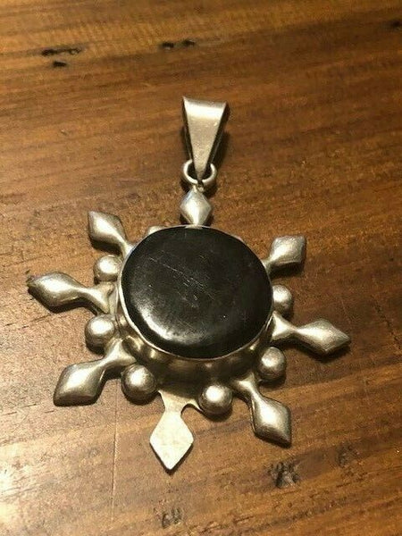 A Sterling Silver Pendant We Named Succession: the Vampire Elite