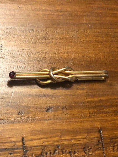 CIipped Wealth, Tie Clip with Glowing Red Stone
