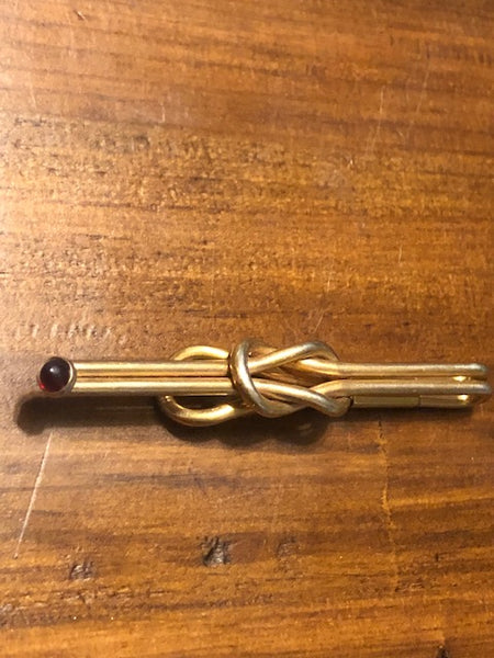 CIipped Wealth, Tie Clip with Glowing Red Stone