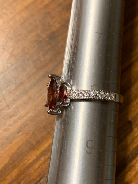 Silver-toned Costume Ring with Three Red Stones:  Three Grantings of Sanguine Power