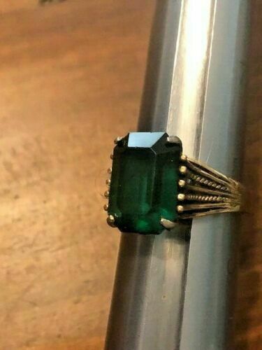 Size 8 1/4 Copper Colored Stone with a Green Stone:  Druidic Wealth Spell