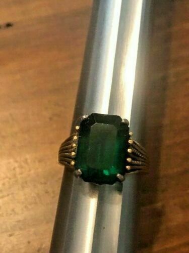 Size 8 1/4 Copper Colored Stone with a Green Stone:  Druidic Wealth Spell
