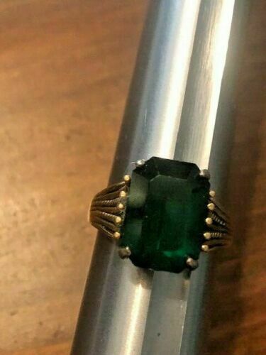 Size 8 1/4 Copper Colored Stone with a Green Stone:  Druidic Wealth Spell