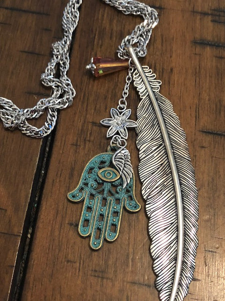 A Hamsa Amulet and Real Metallic Angel Feather-- Youtube Video